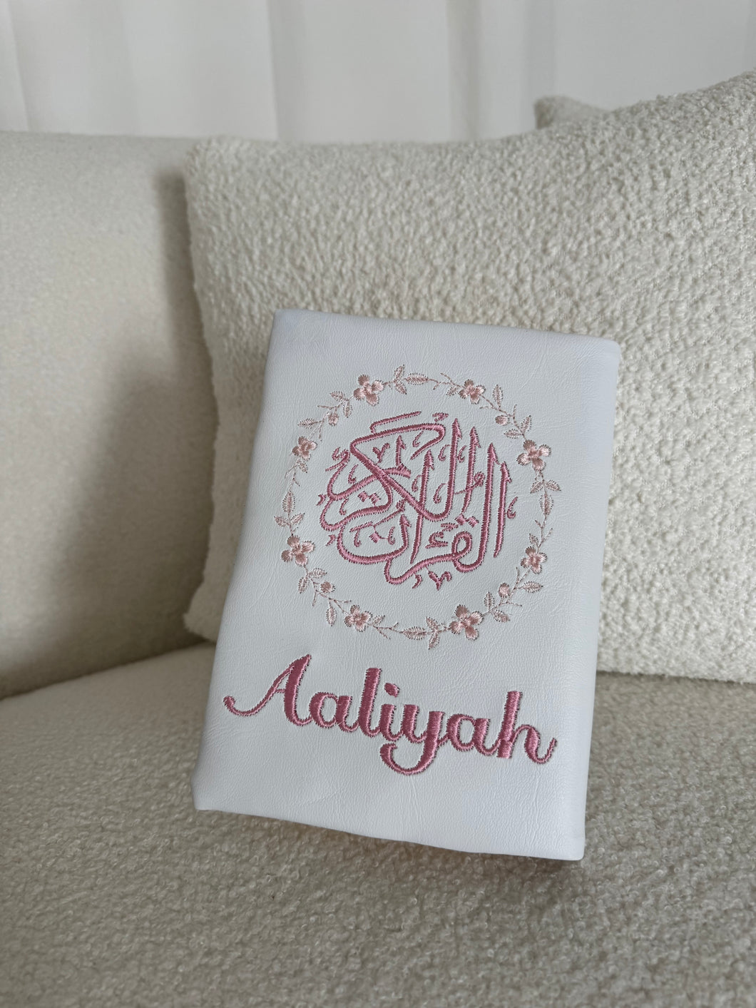 Floral logo Quran